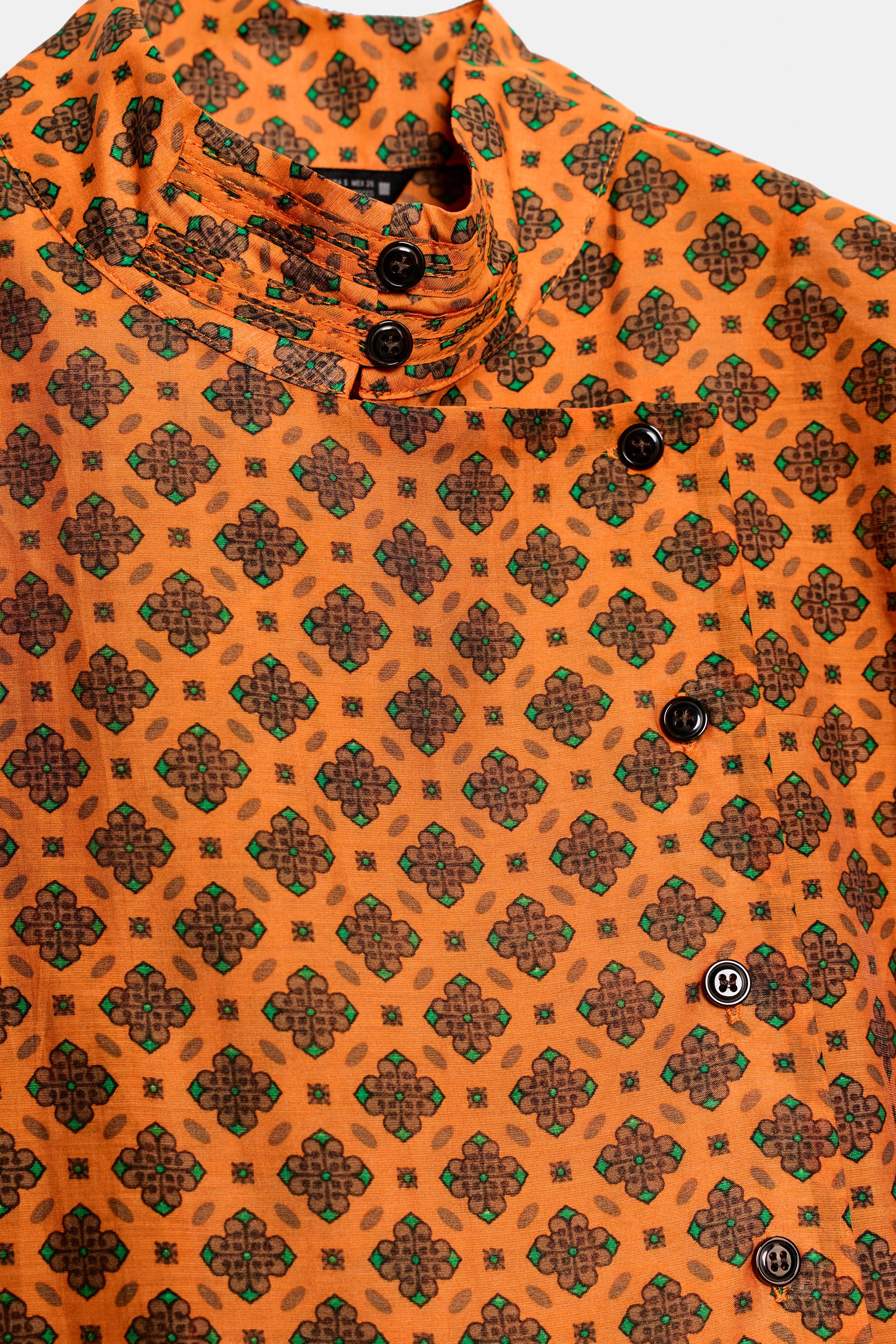 PRINTED WRAP BLOUSE
